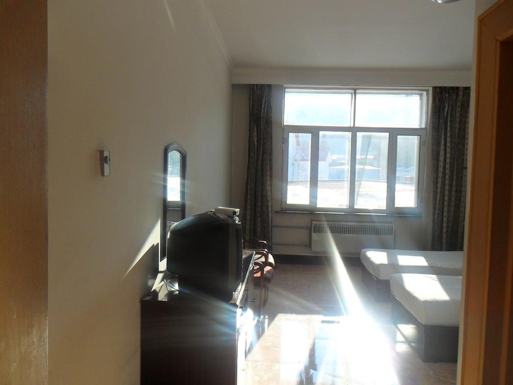 Yabuli Xintong Hotel Shangzhi Rum bild