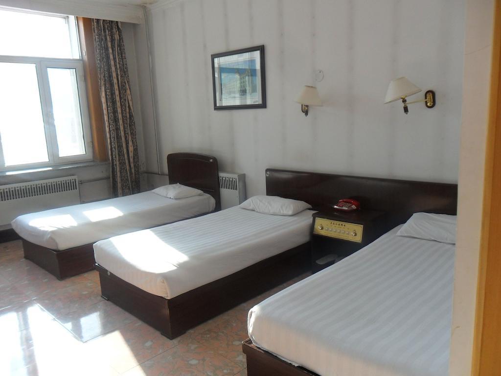 Yabuli Xintong Hotel Shangzhi Rum bild